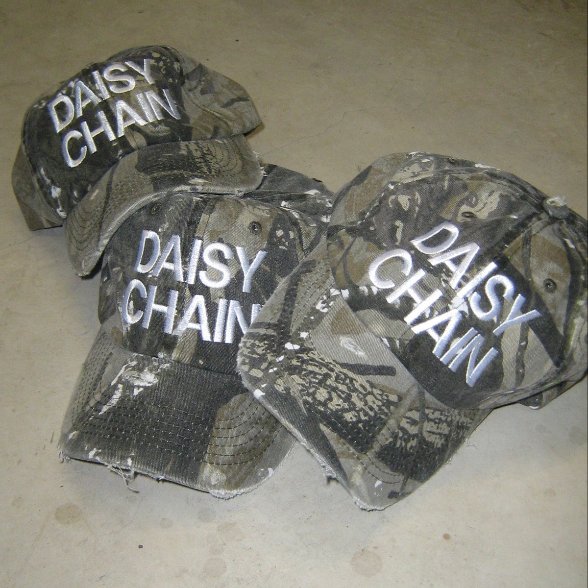 daisy chain camo cap (no ring)